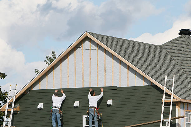 Professional Siding Replacement technician working in Churchton, MD